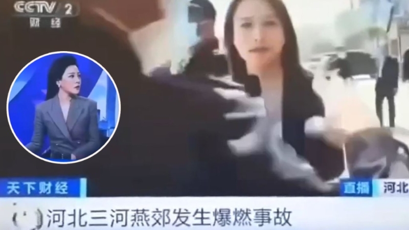 央視總臺記者在爆炸現場進行直播 央視總臺記者在爆炸現場進行直播