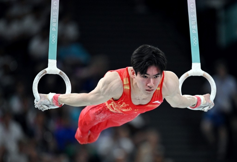 張博恒體操男子全能獲銀牌。 新華社