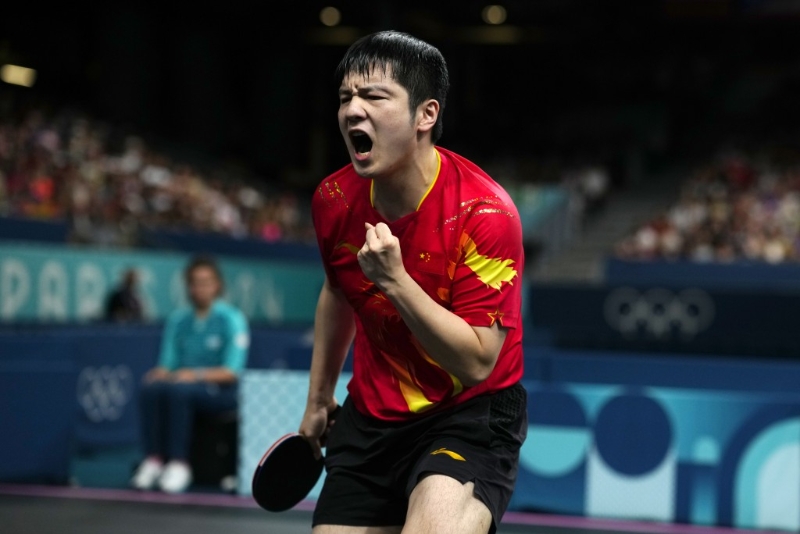 27歲國家隊乒乓球好手樊振東在男單賽事上取得金牌外，在男子團體賽亦成功奪金。 AP