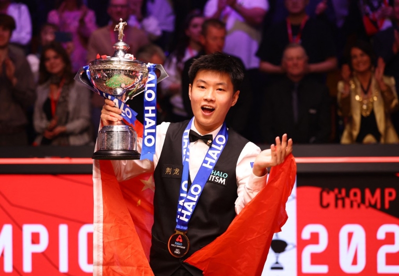 趙心童奪冠后，成為賽事史上首位封王的業余球手，以及首位稱霸的中國球手。路透社.jpg