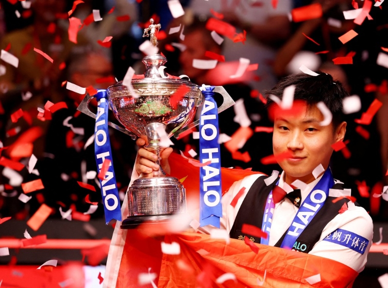 趙心童奪冠后，成為賽事史上首位封王的業余球手，以及首位稱霸的中國球手。 路透社.jpg